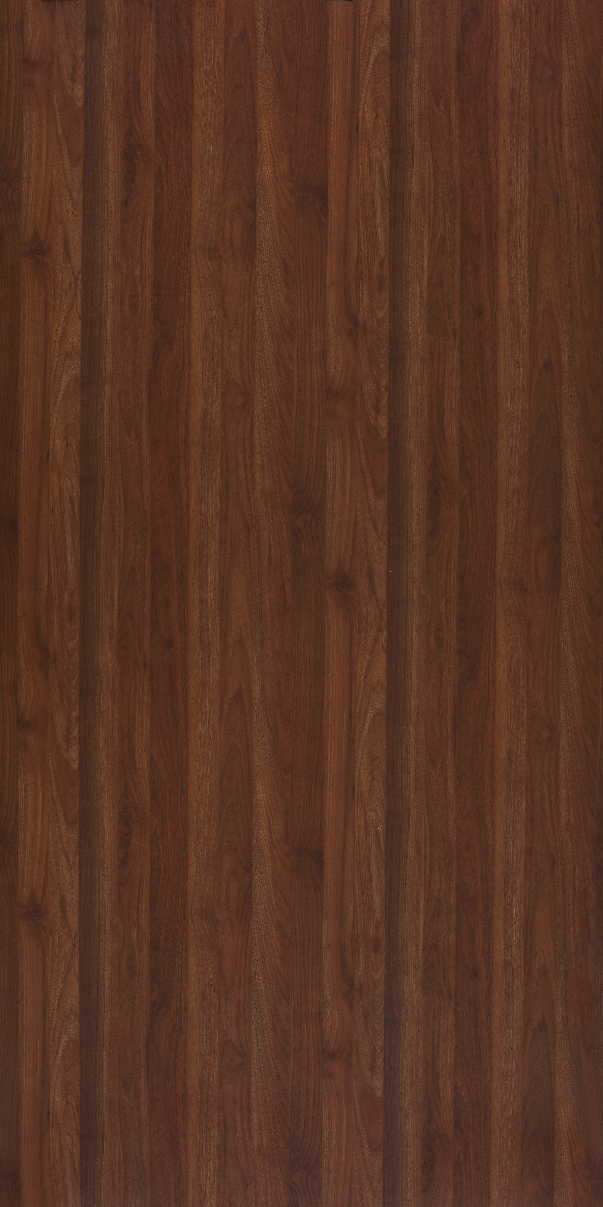 A close-up of a Brown 10478 FWD Precott Walnut with a Texture finish Decorative Laminate available at Material Depot in Bangalore