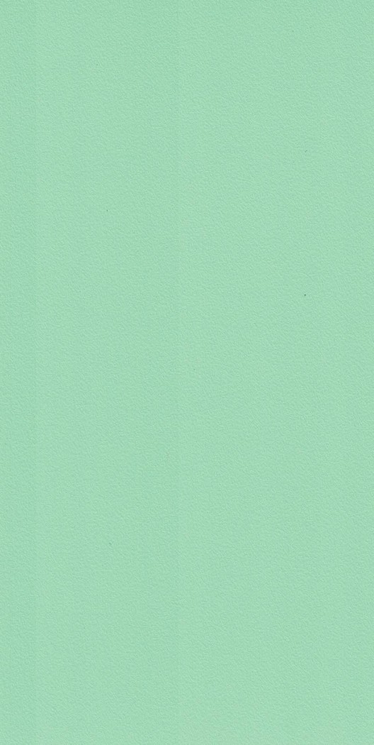 A close-up of a Green 1410 Pista Green with a Suede finish Decorative Laminate available at Material Depot in Bangalore