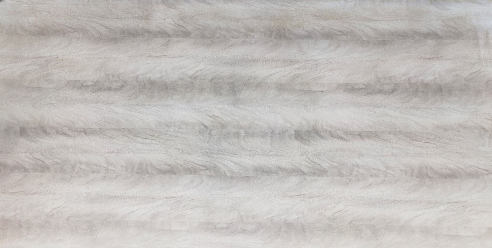 A close-up of a White 3343 Mahagony Crotch III with a Suede finish Decorative Laminate available at Material Depot in Bangalore