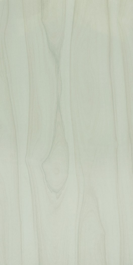 A close-up of a White 8632 Montana Walnut Light with a Texture finish Decorative Laminate available at Material Depot in Bangalore