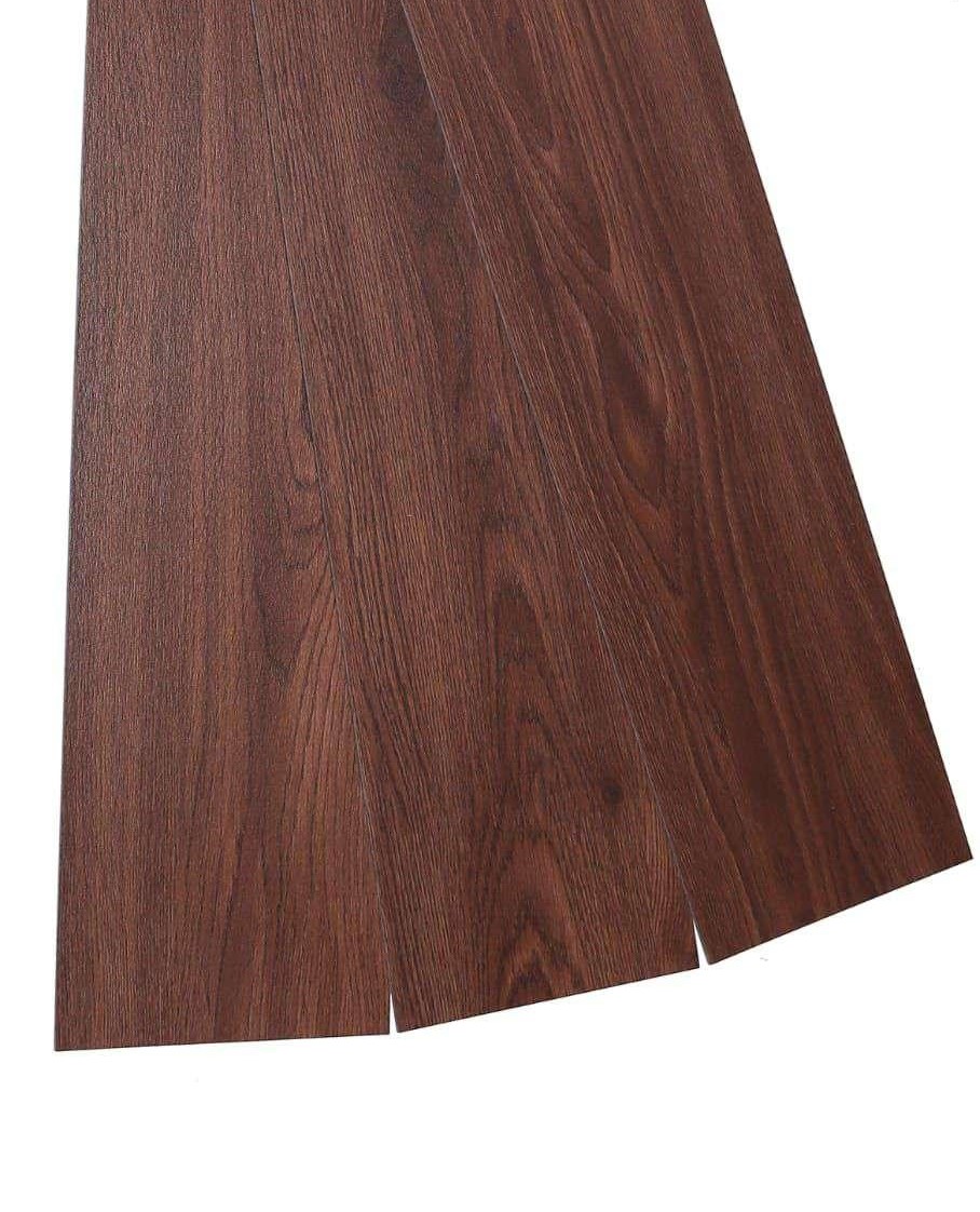 A close-up of a PVC Vinyl Floor Azeri Mahogany Crystal Finish Vinyl Luxe VF 00141 | 3 ft x 6 Inch x 1.5 mm | Wear Layer: 0.10 mm | UV Coating | Waterproof | Suitable for Flooring, Living Room, Bedroom available at Material Depot in Bangalore