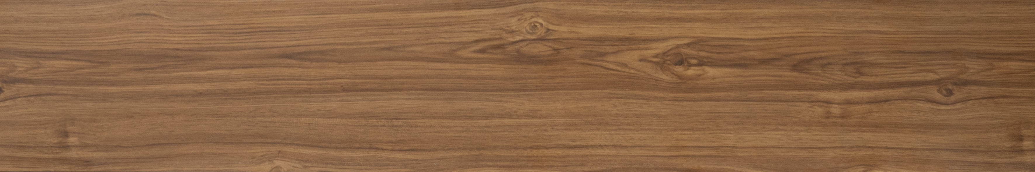 A close-up of a HDF Laminate Wood Floor Crystal Finish Aristo LF 00242 | 4 ft x 8 inch x 8 mm | AC4 Grade | Arc Click With Wax Coating | Paper Joint Groove | Suitable for Flooring, Living Room, Bedroom available at Material Depot in Bangalore