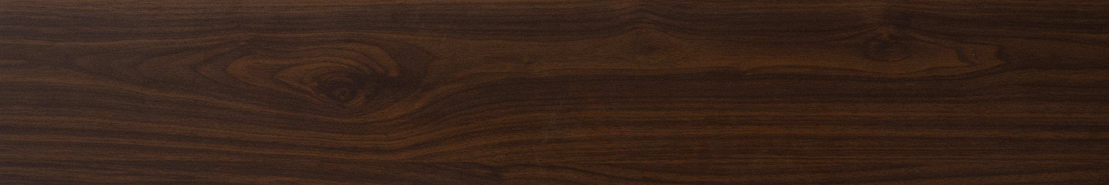 A close-up of a HDF Laminate Wood Floor Crystal Finish Aristo LF 00243 | 4 ft x 8 inch x 8 mm | AC4 Grade | Arc Click With Wax Coating | Paper Joint Groove | Suitable for Flooring, Living Room, Bedroom available at Material Depot in Bangalore