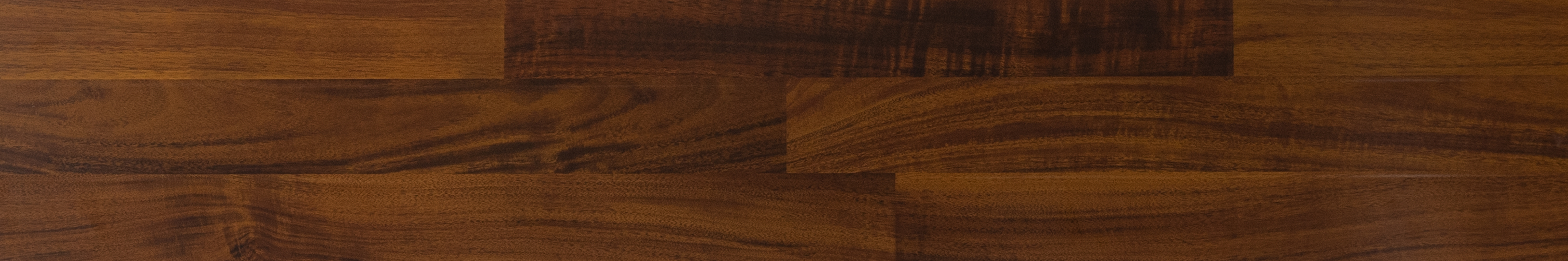 A close-up of a HDF Laminate Wood Floor Glossy Finish Gleam LF 00261 | 4 ft x 8 inch x 8 mm | AC4 Grade | Arc Click With Wax Coating | U Groove | Suitable for Flooring, Living Room, Bedroom available at Material Depot in Bangalore