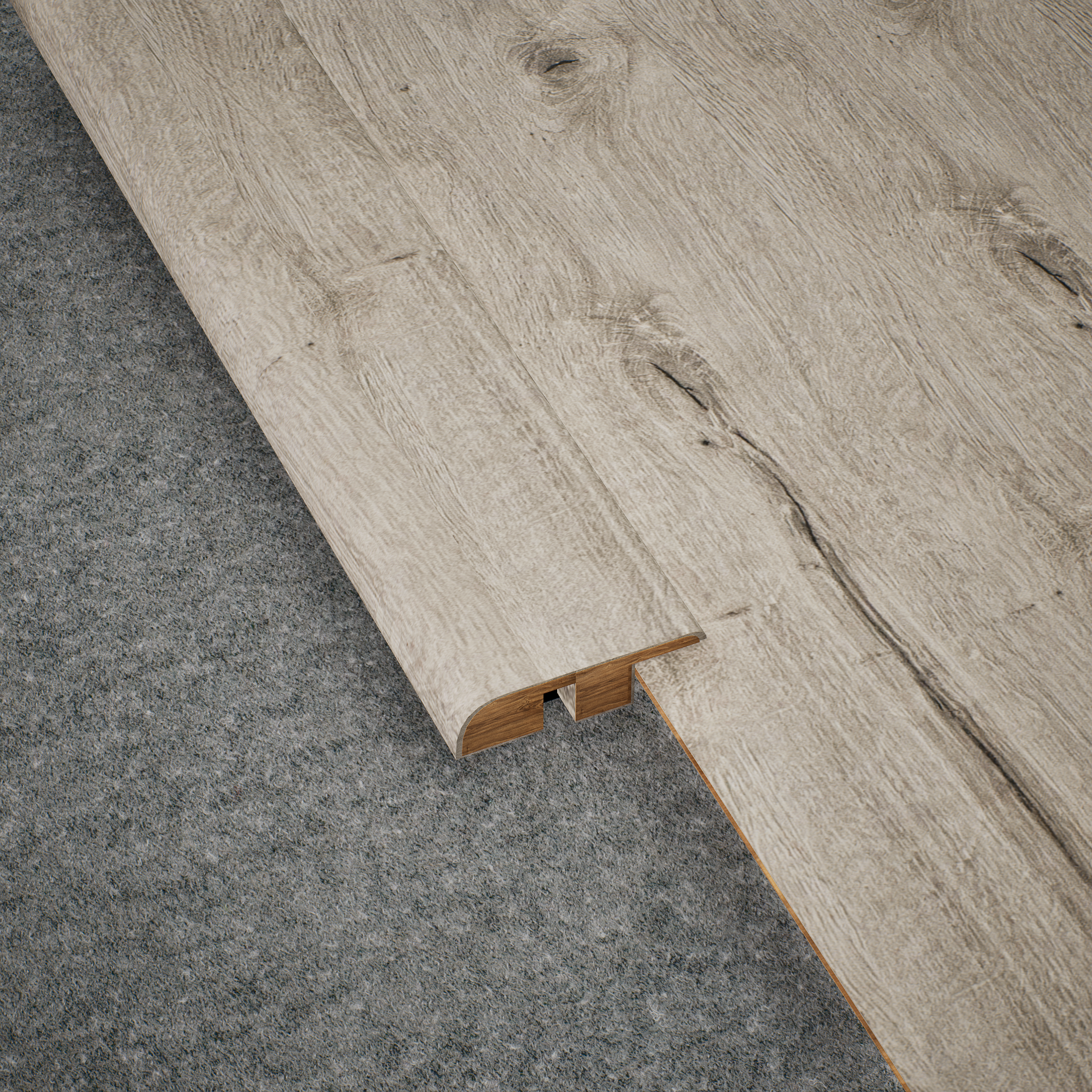 A close-up of a MDF Reducer R Profile Aristo Premium PM 00369 I | 8 ft x 16 mm x 12 mm | Compatible for Laminate Wood Floor LF 00246 available at Material Depot in Bangalore