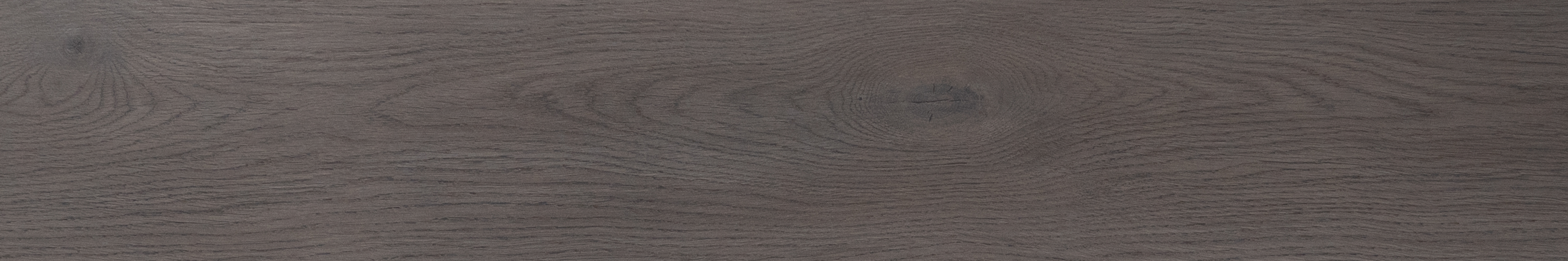 A close-up of a LF 00208 Luxury Series SPC Floor 1220x183 mm - 6.5 mm available at Material Depot in Bangalore