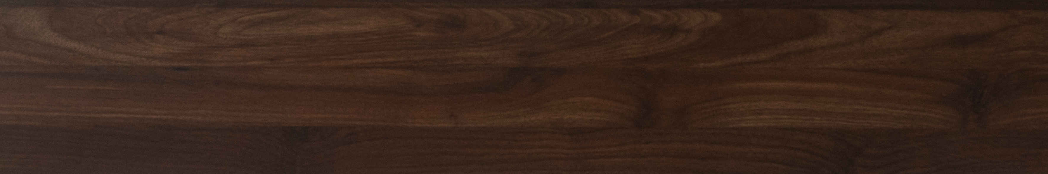 A close-up of a LF 00208 Luxury Series SPC Floor 1220x183 mm - 6.5 mm available at Material Depot in Bangalore