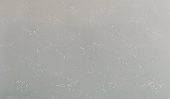 A close-up of aQR 00077 Opulence Series Calacatta Mystery Gray 3276x1651 mm Polished Finish Quartz - 20 mm (10 Years Warranty) available at Material Depot in Bangalore