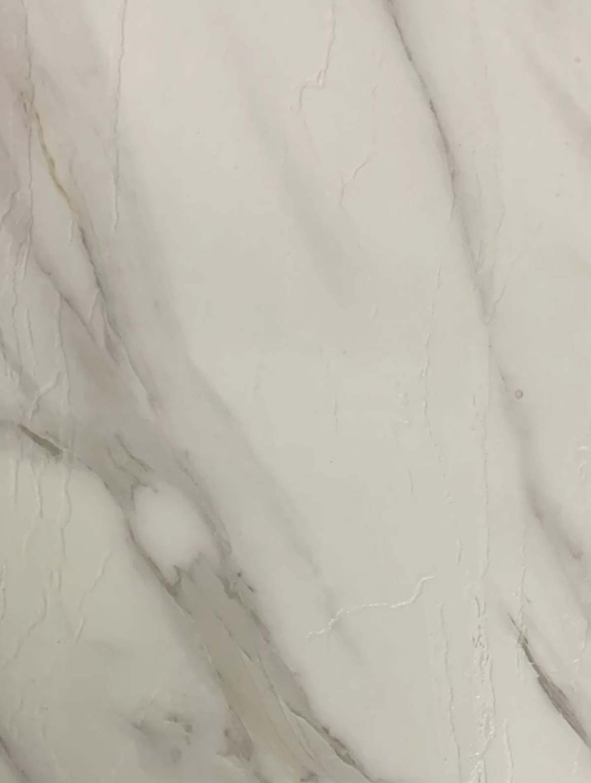 A close-up of a Grey DM 1142 Sagnada Marble with a Texture finish Decorative Laminate available at Material Depot in Bangalore