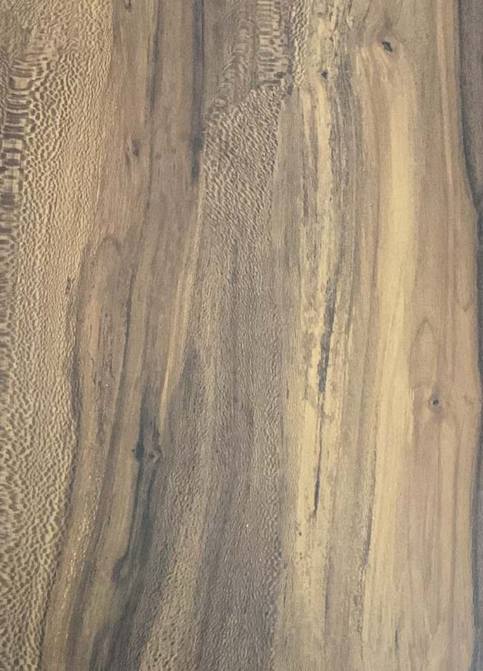 A close-up of a Wenge VT 1107 Durby Brown with a Texture finish Decorative Laminate available at Material Depot in Bangalore