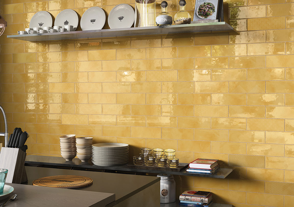 A close-up of a TL 03801 Yellow 300x100 mm Glossy Finish Ceramic Wall  Subway Tile - 10 mm  with a Glossy finish available at Material Depot in Bangalore