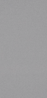 A close-up of a Grey KL 801 Grey with a High Gloss finish Acrylic Laminate available at Material Depot in Bangalore