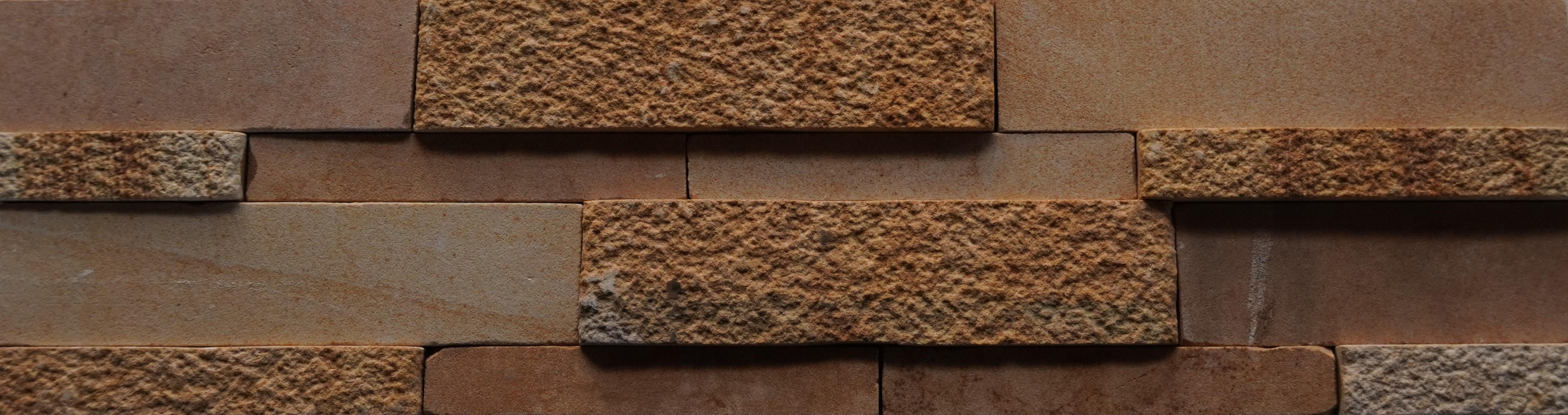 A close-up of a 1060 Natural Stone 600x150 mm Wall Cladding available at Material Depot in Bangalore