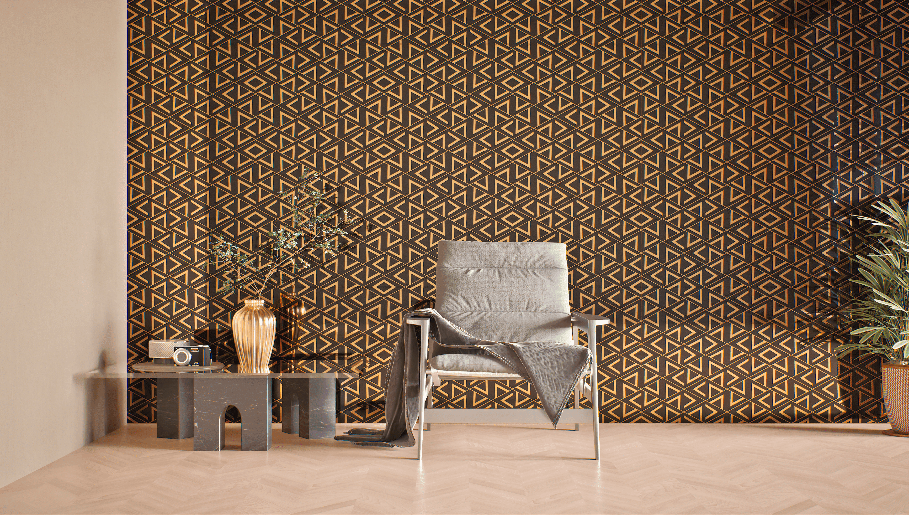 A living room with a geometric wallpaper accent wall and a chair in front of it. The geometric design incorporates glass highlighter tiles that create a shimmering effect.