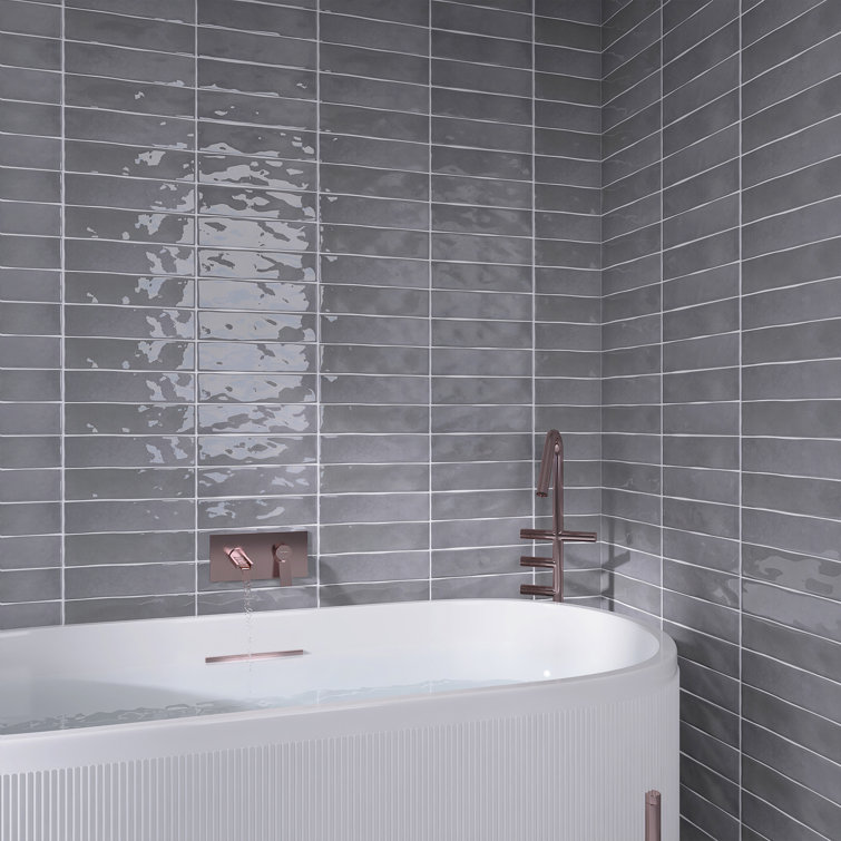 Contemporary Elegance Grey Reflective Tiles with Bronze Accents in Bathroom | Material Depot