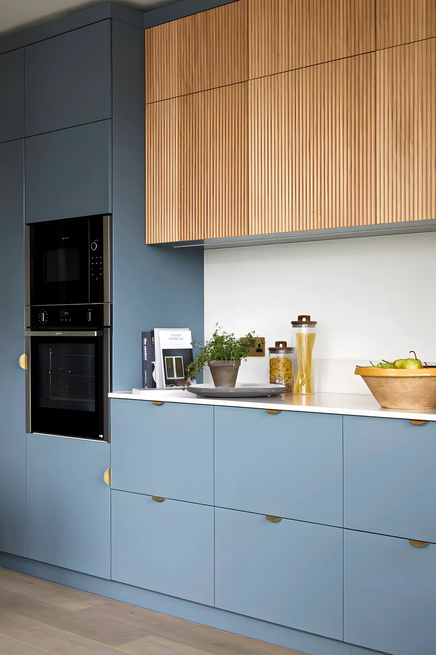 Contemporary Kitchen with Blue Cabinets and Fluted Wood Accents | Material Depot