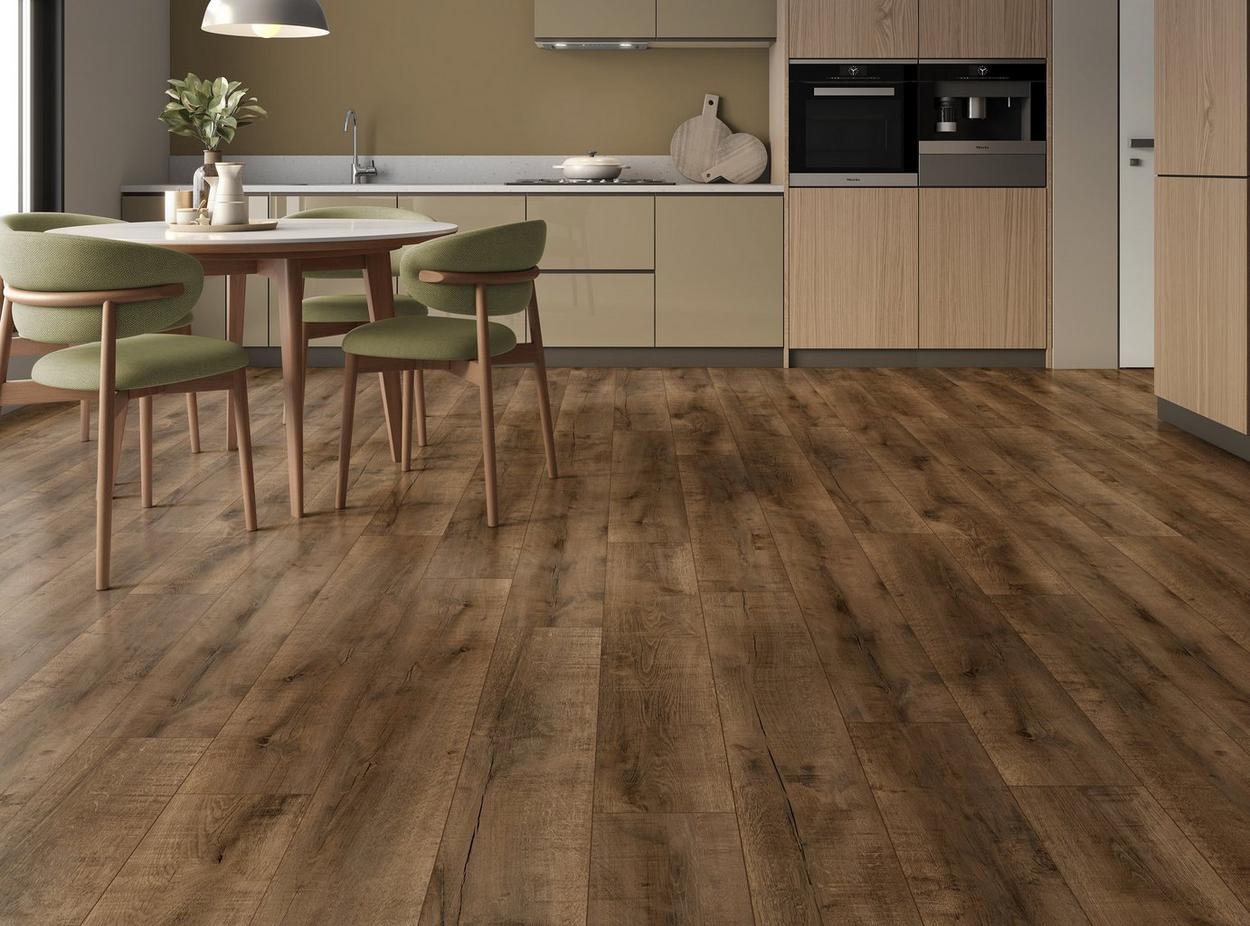 Kitchen with wooden floor and beige cabinets