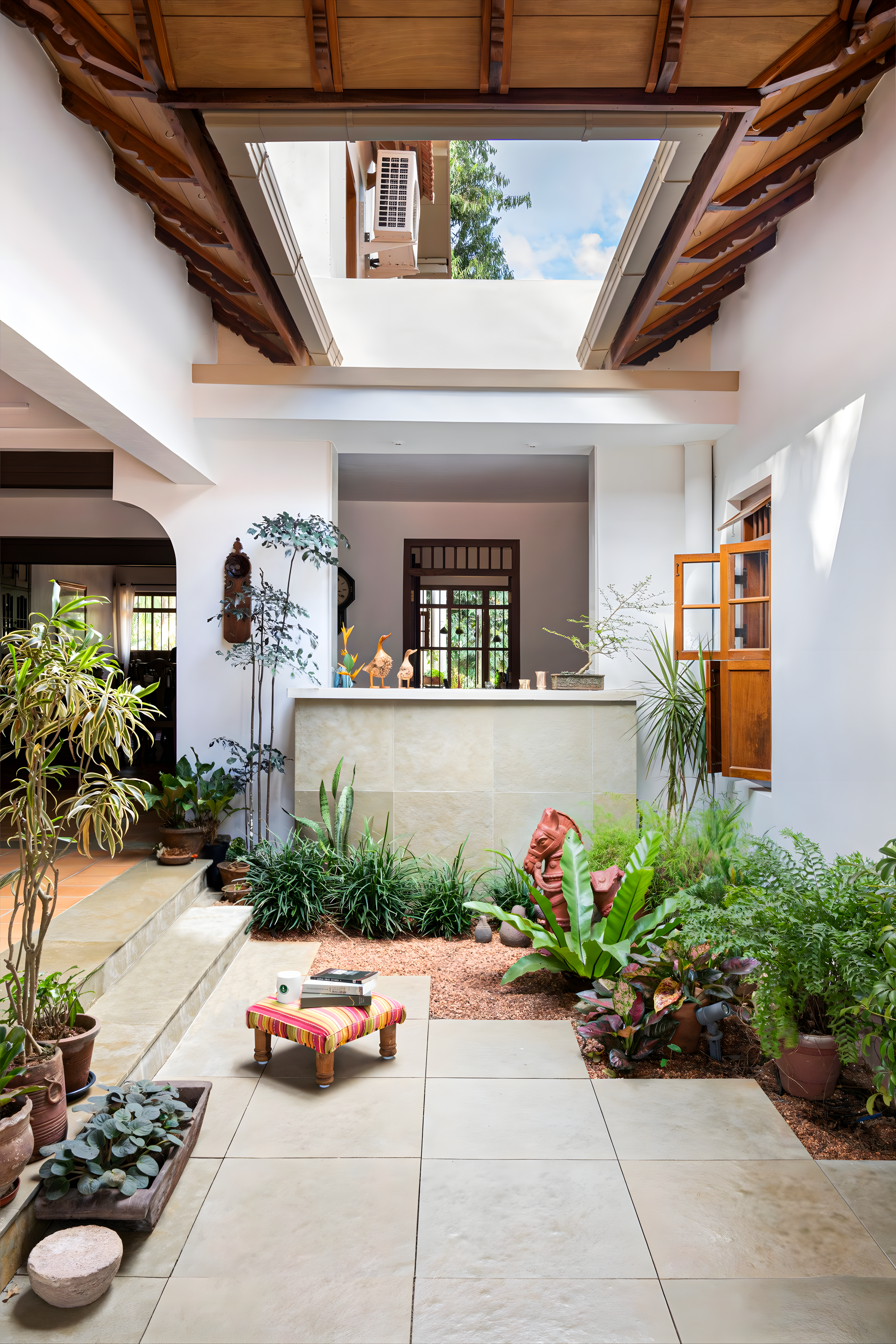 Cozy Patio with Patterned Tiles and Outdoor Seating | Material Depot