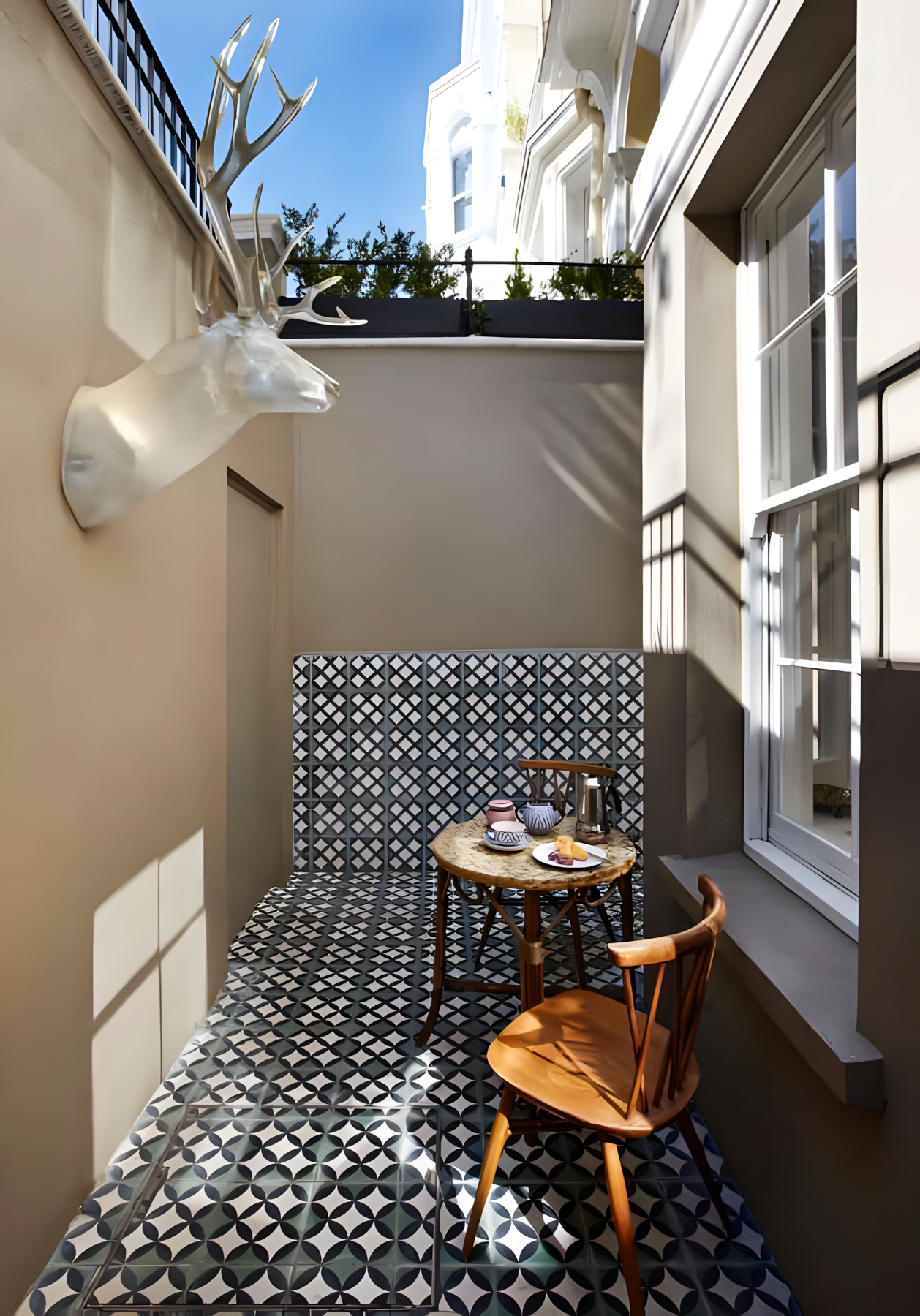 Cozy Patio with Patterned Tiles and Vintage Decor | Material Depot