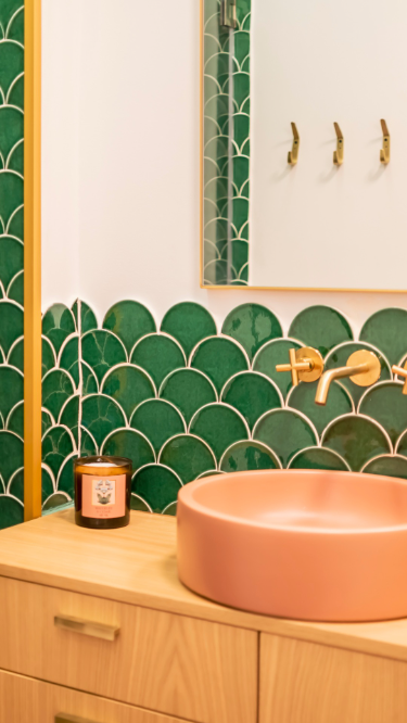 Elegant Bathroom with Green Scalloped Tiles and Contemporary Fixtures | Material Depot