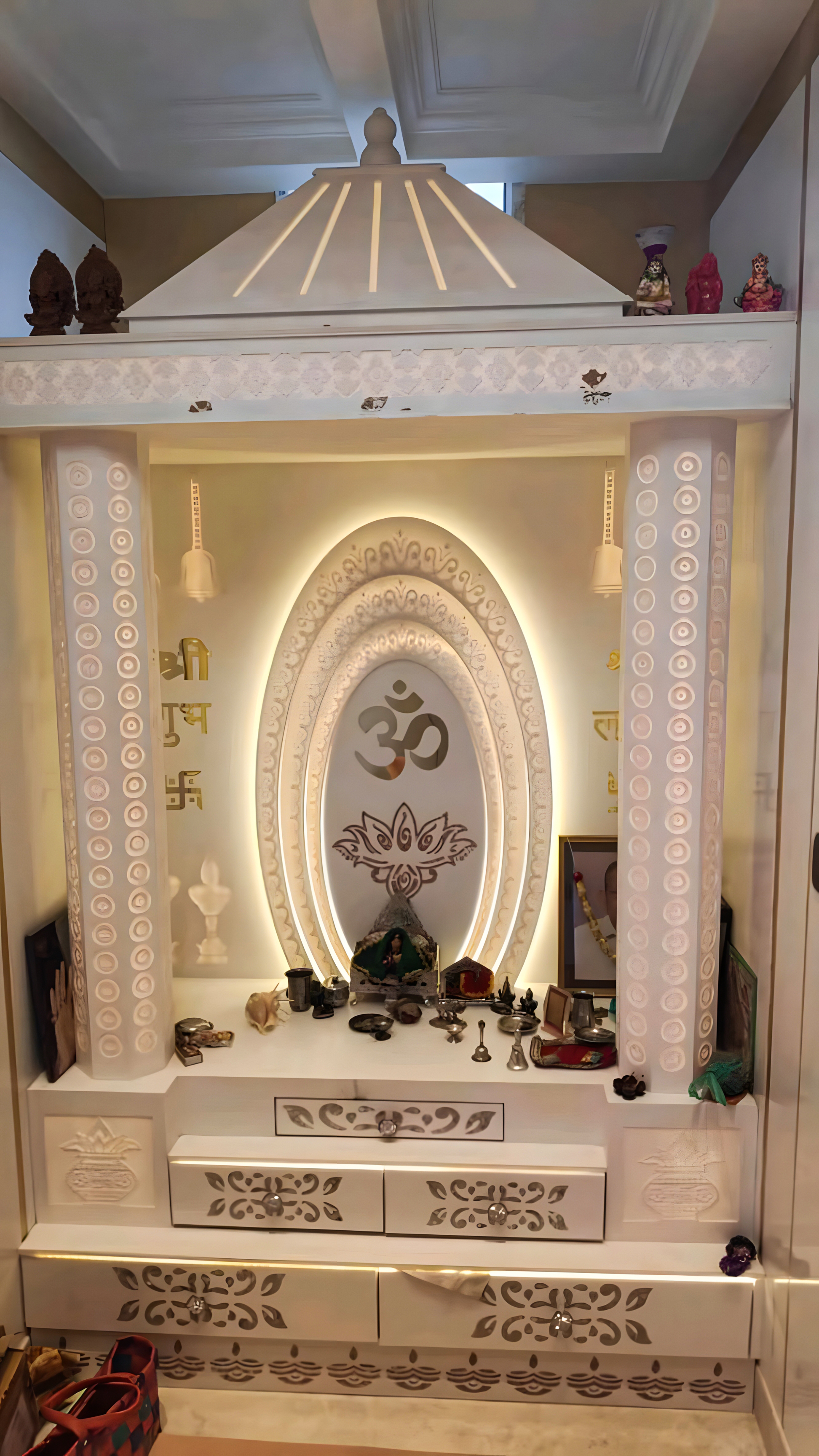 Intricate White Pooja Room with Ornate Design and Backlit Om Symbol | Material Depot