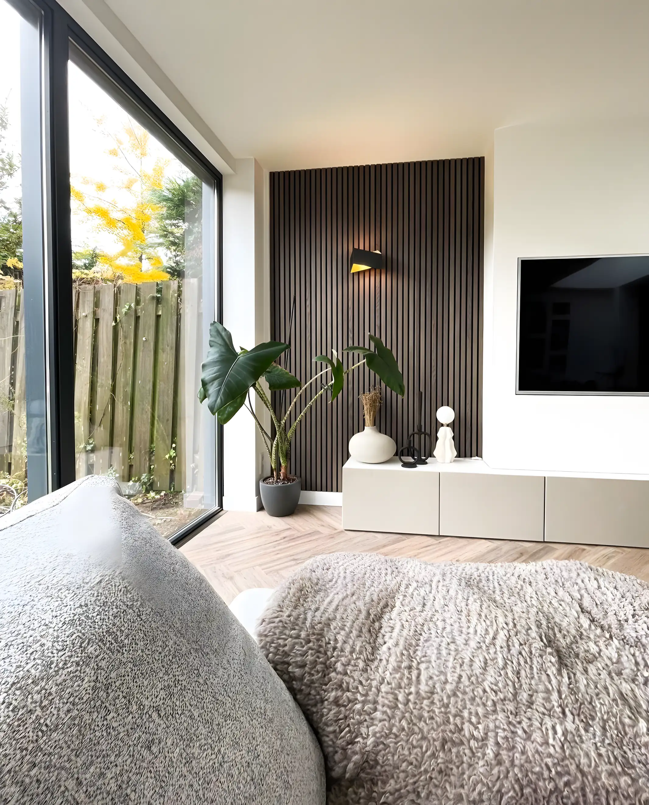 Minimalist Living Room with Fluted Accent Wall and Natural Lighting | Material Depot