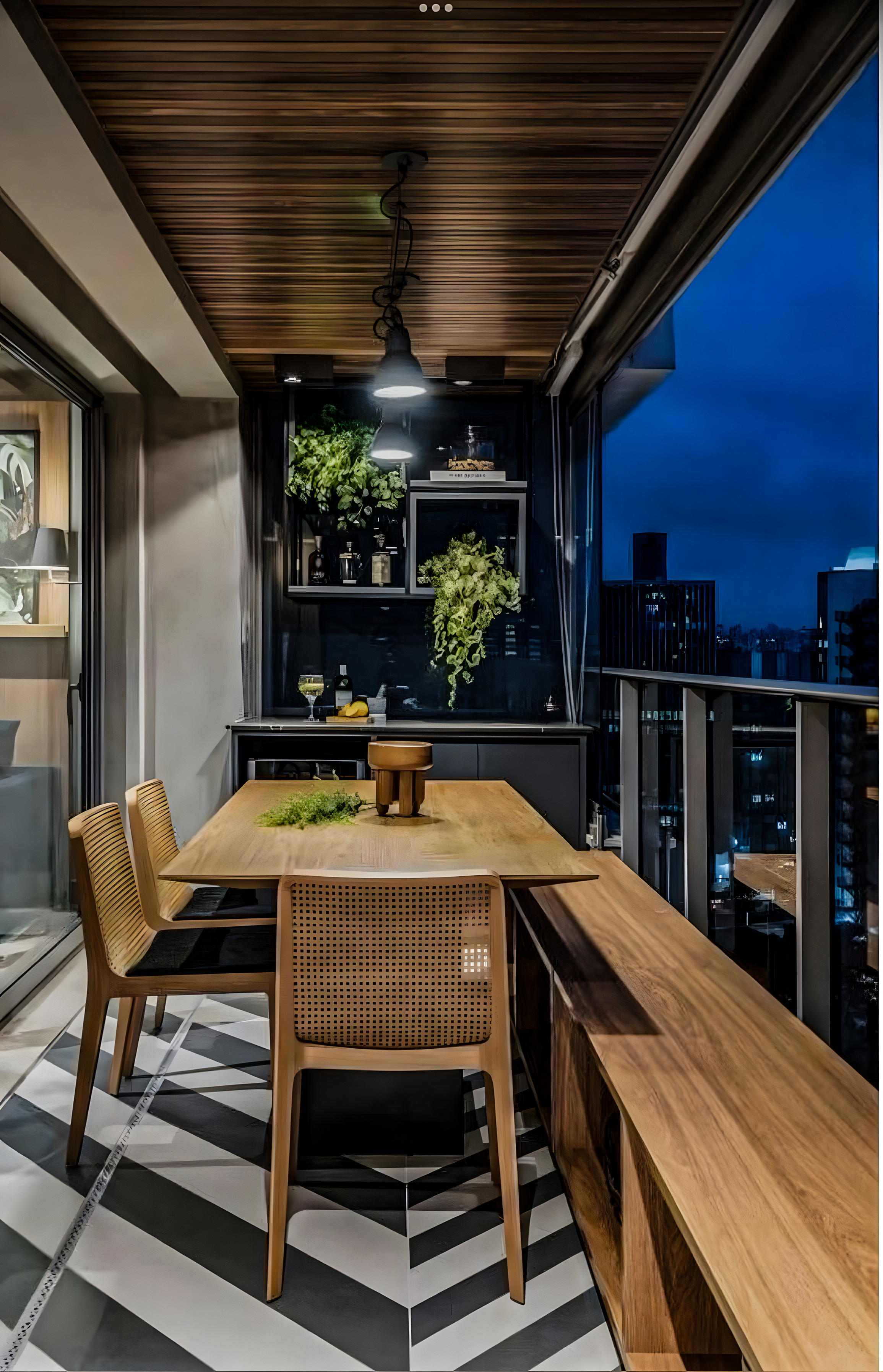 Modern Balcony with Herringbone Tiles and Outdoor Dining Area | Material Depot