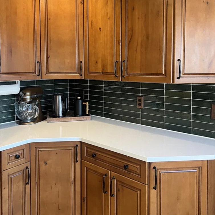 Modern Contrast White Countertop with Angular Design and Reflective Black Tiles | Material Depot