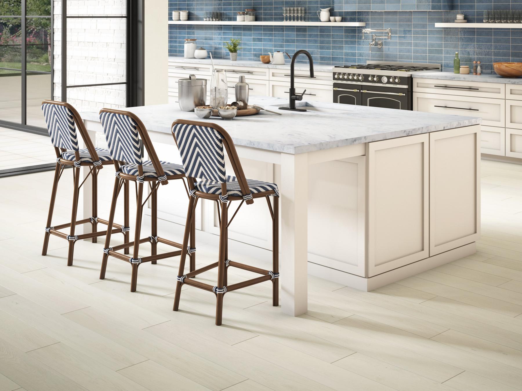 Kitchen with blue stone tiles and beige laminate