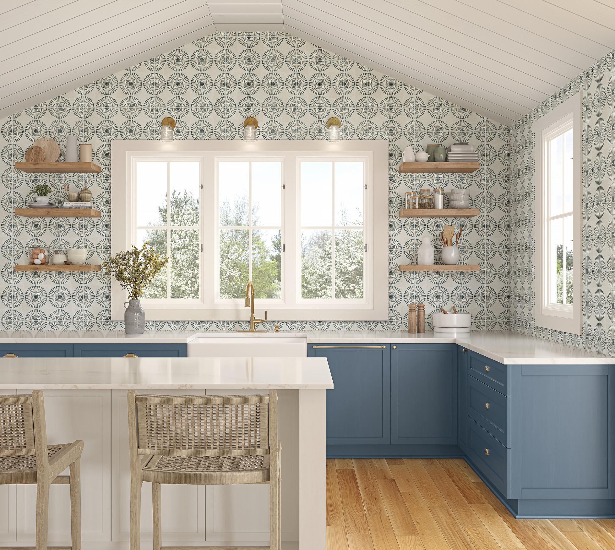 Kitchen with flowery tiles blue cabinet and wooden floor