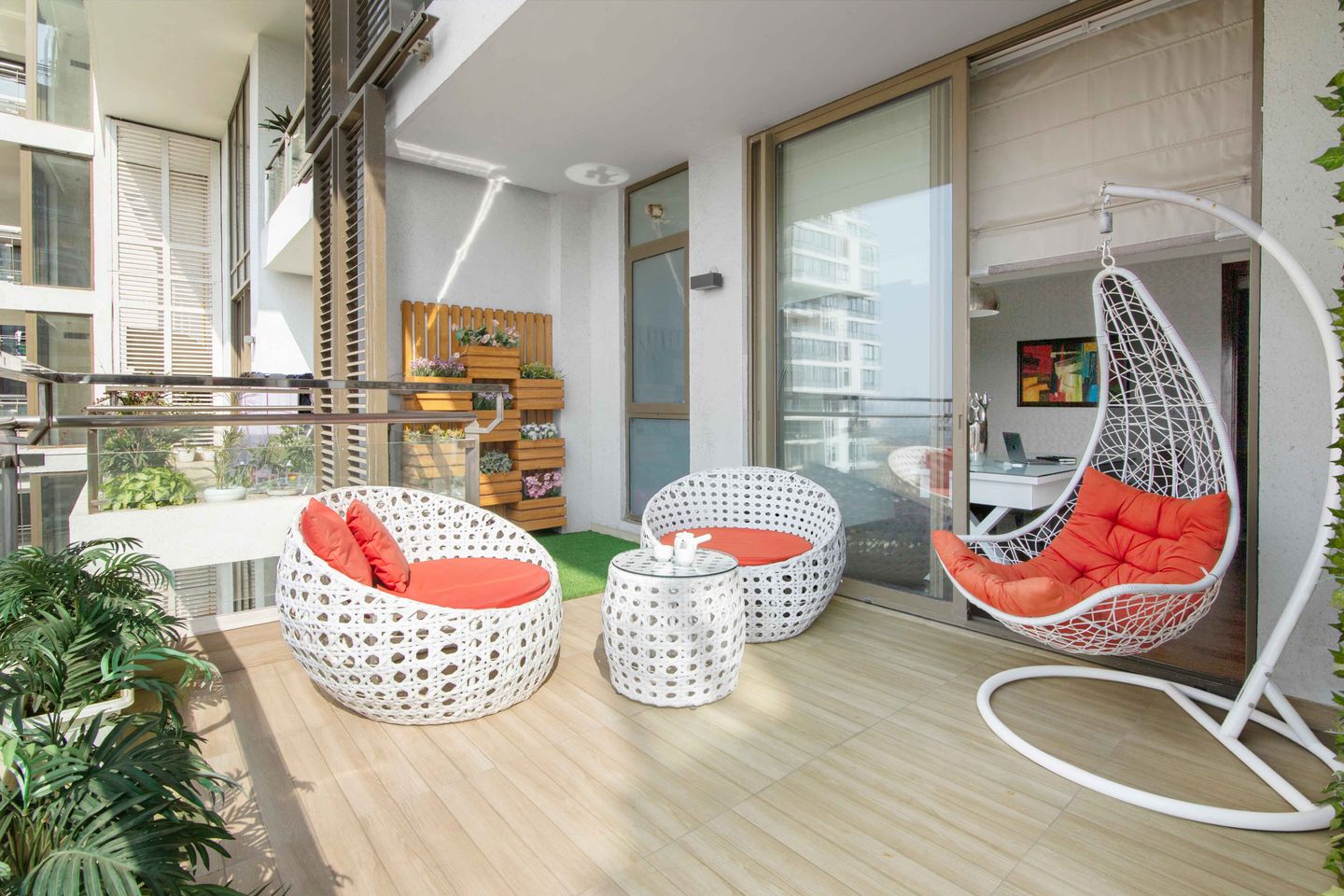 Modern balcony with wooden wall planter and stylish furnishings.