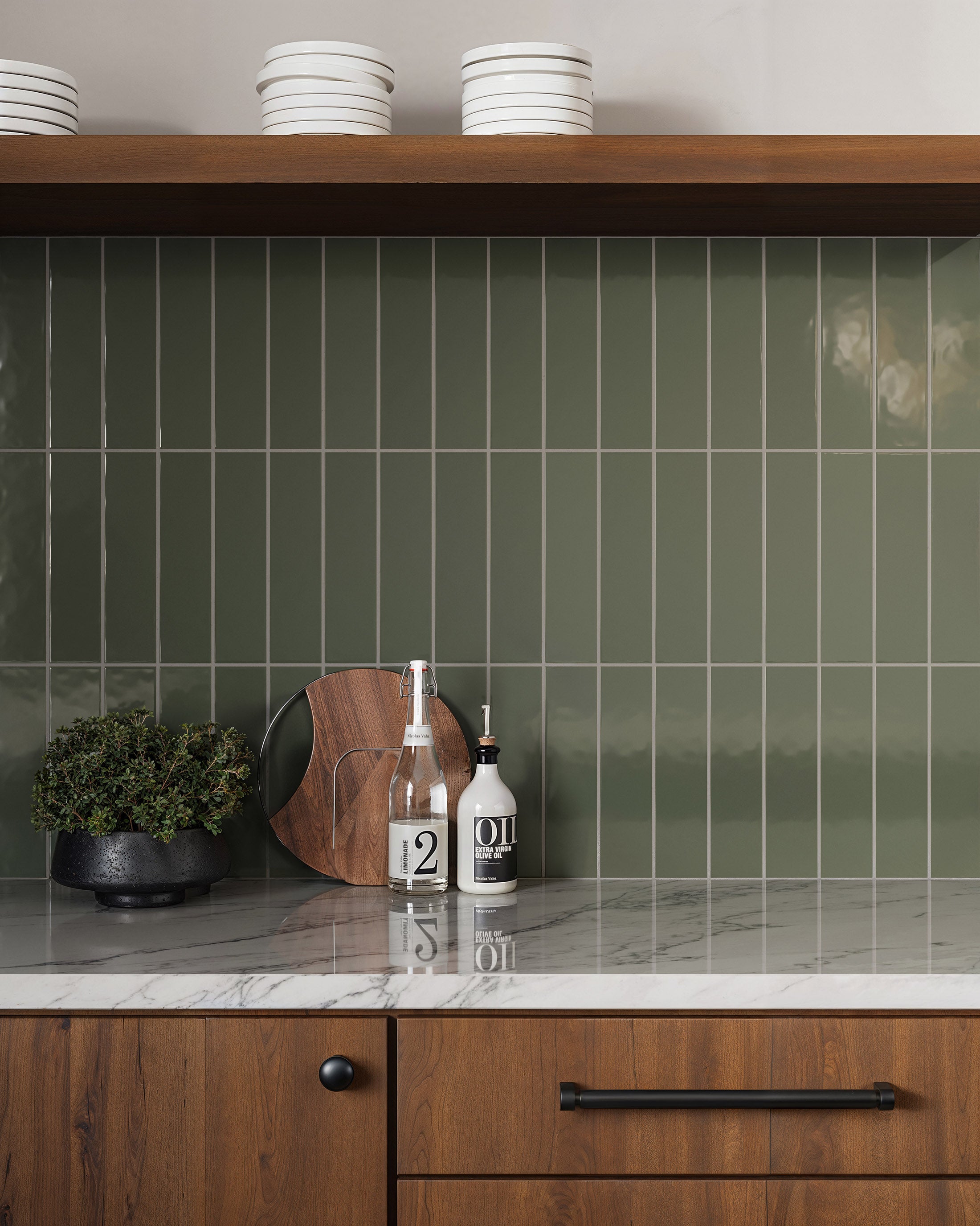 Serene Green Tiled Backsplash Kitchen with Warm Wood Cabinets and Marble Countertops | Material Depot