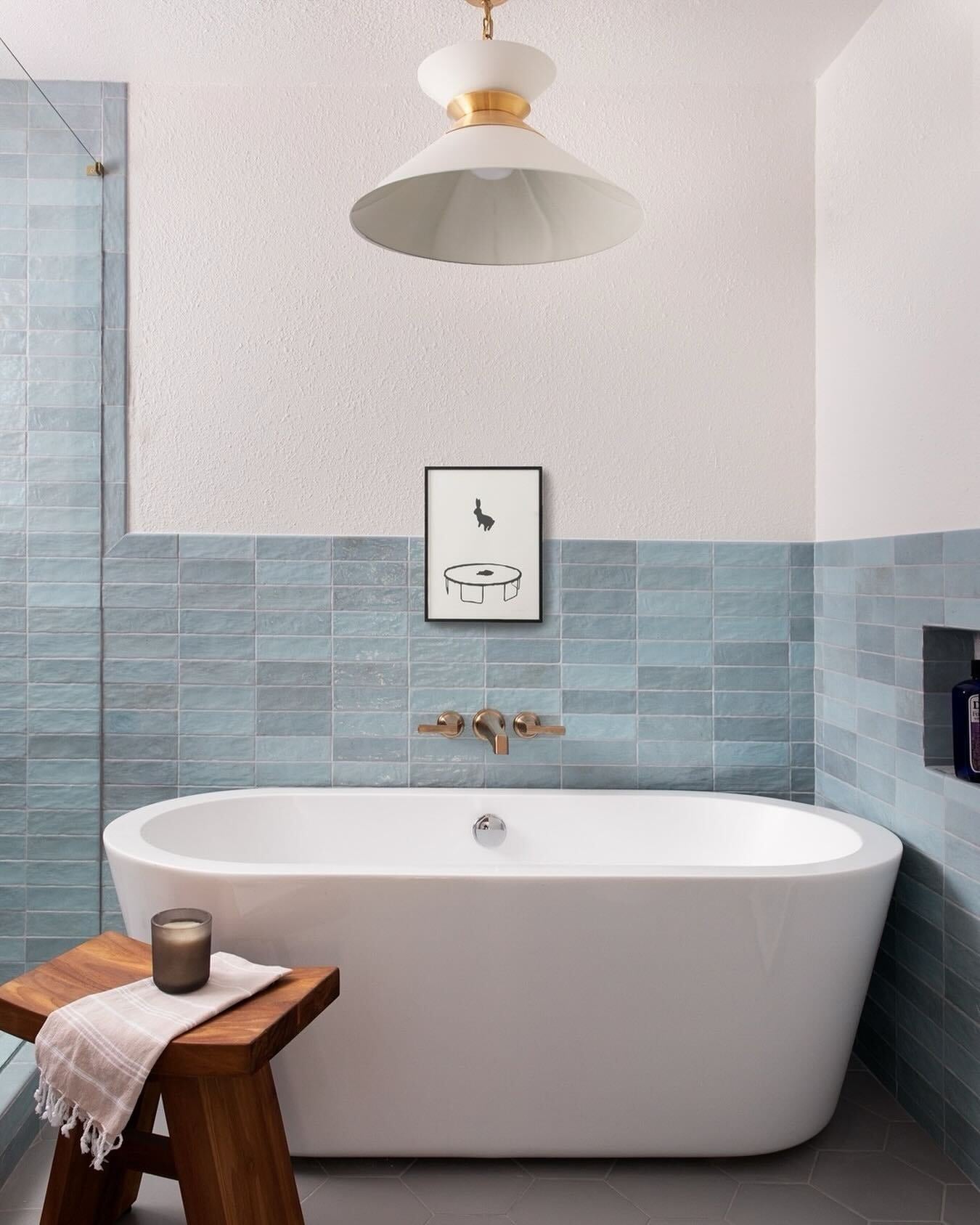 Serene Minimalist Bathroom with Blue Tile Accent Wall and Freestanding Tub | Material Depot