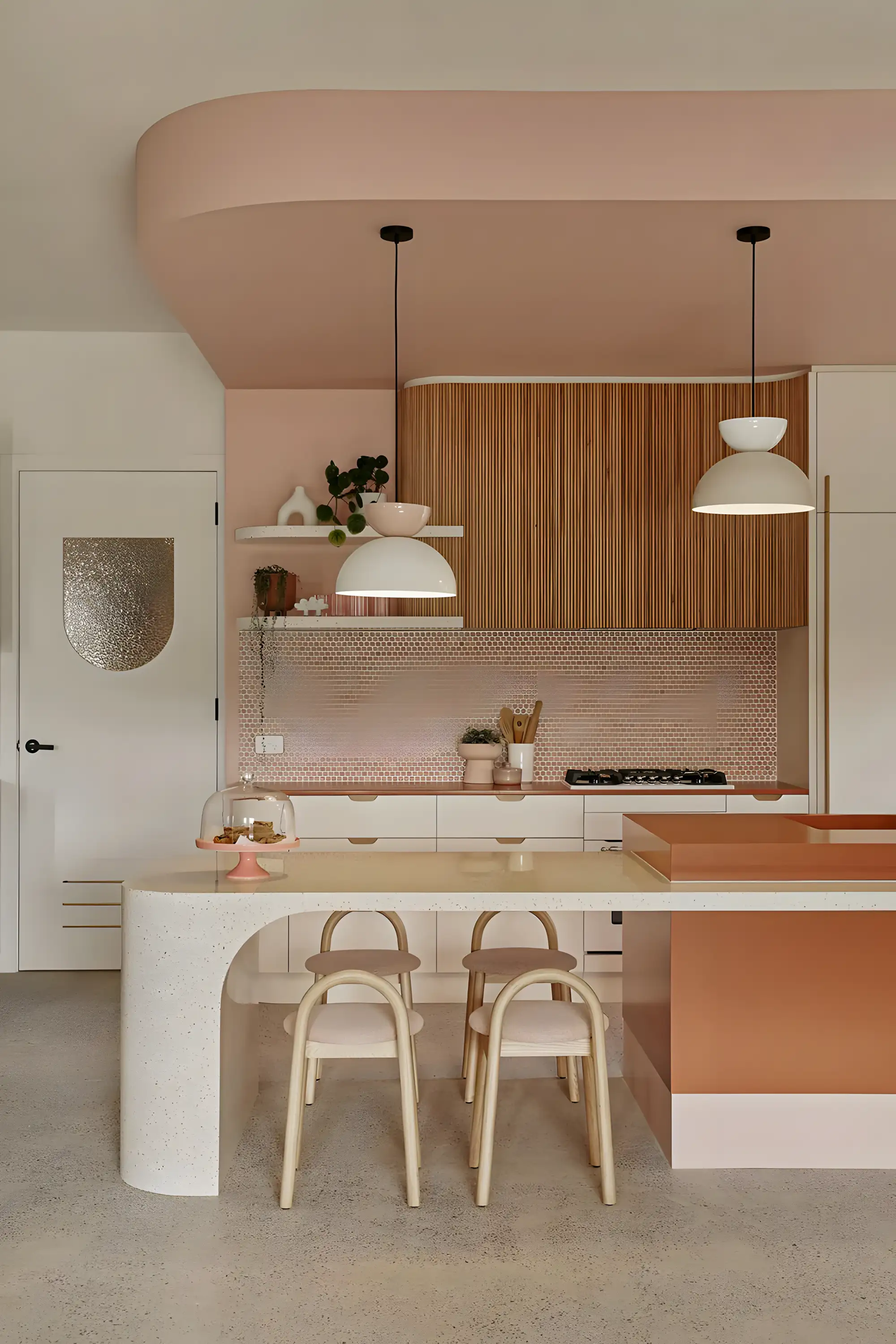 Soft Pink and Curved Elegance: A Contemporary Kitchen Design | Material Depot