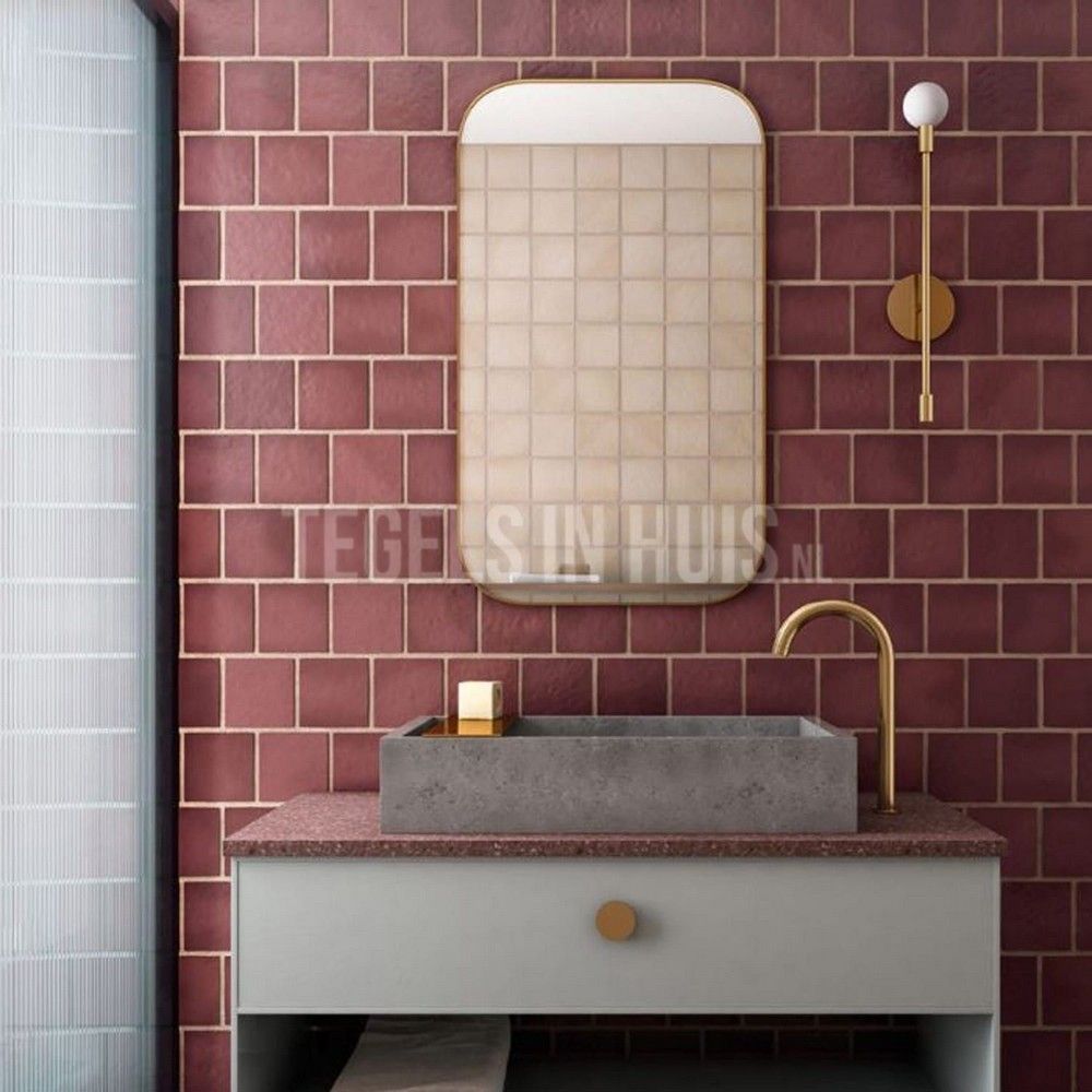 Sophisticated Bathroom with Warm Burgundy Tiles and Contemporary Fixtures | Material Depot