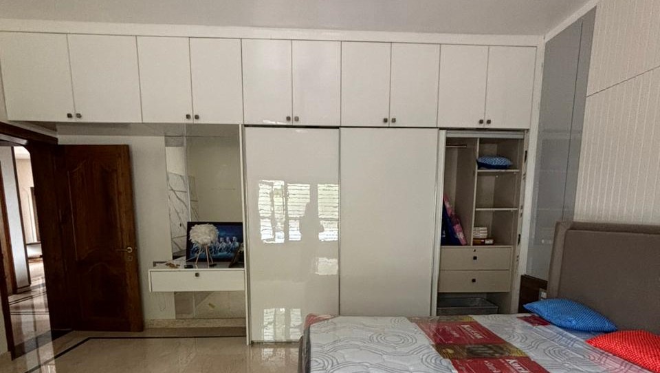 Spacious Bedroom with Built-in Wardrobes in Bengaluru | Material Depot