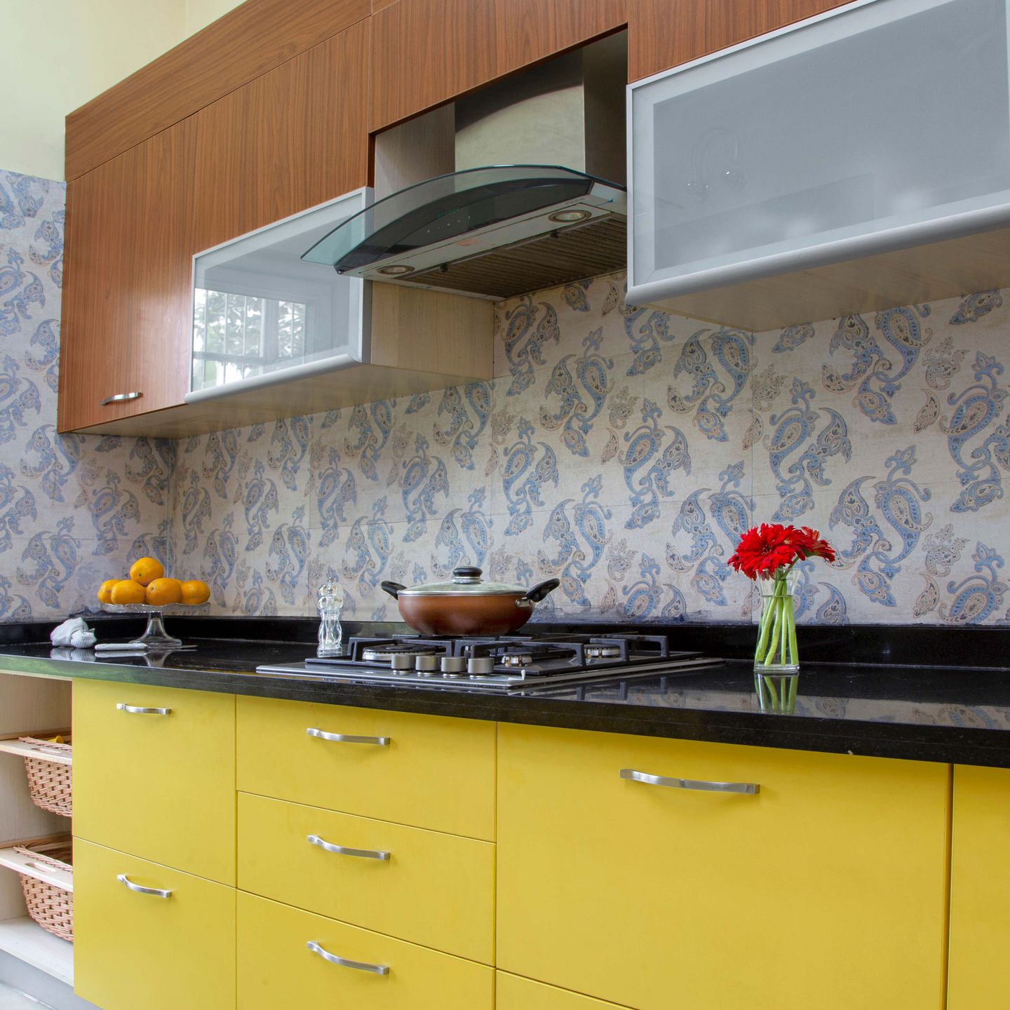 Sleek straight kitchen in a Noida 3 BHK flat