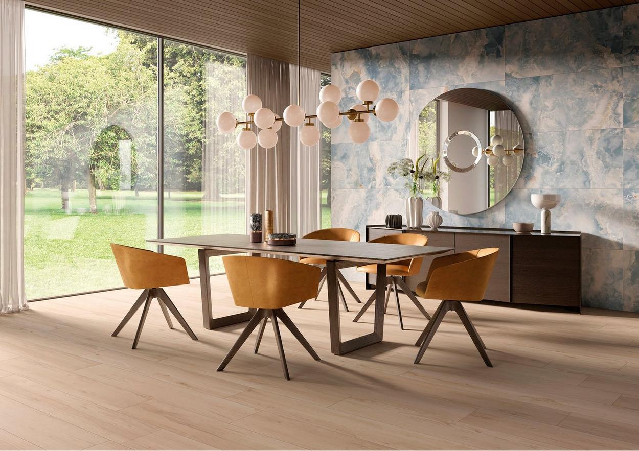 Dining area with patterned tiles and wooden floor