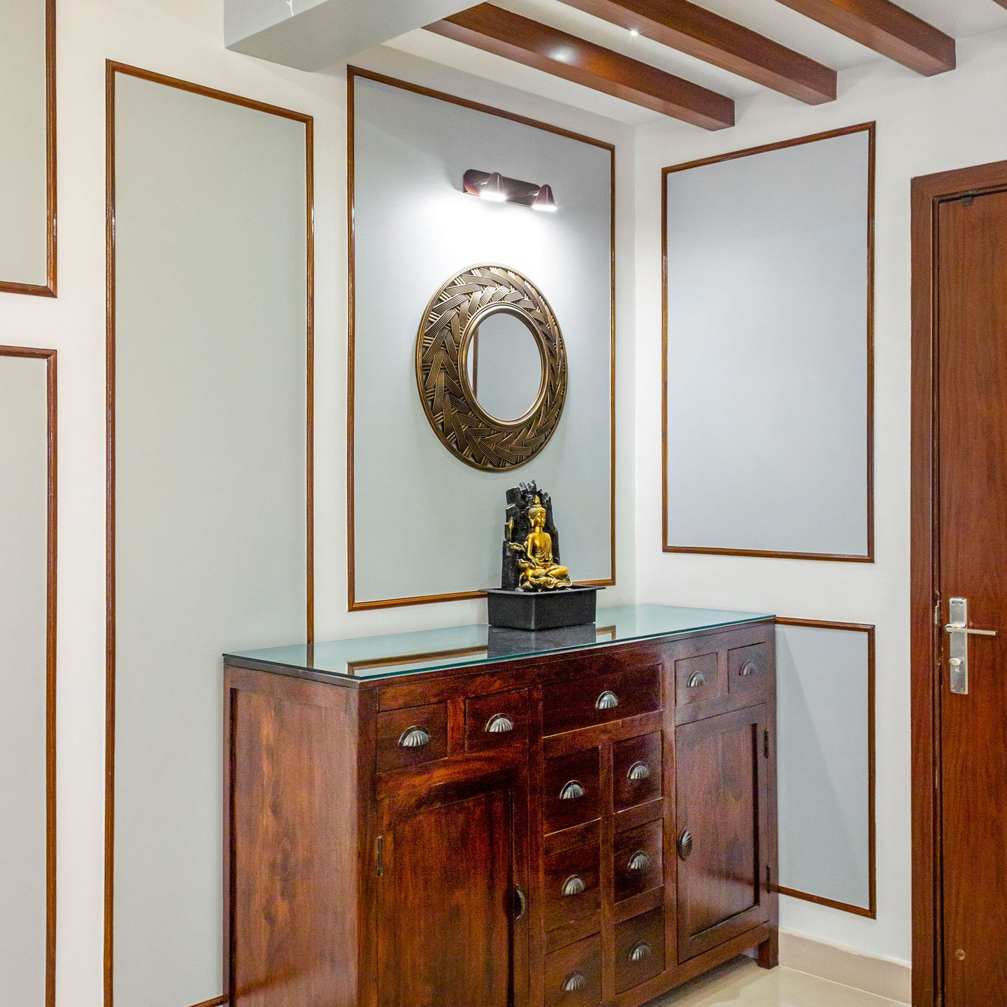 Elegant Foyer with Buddha Statue