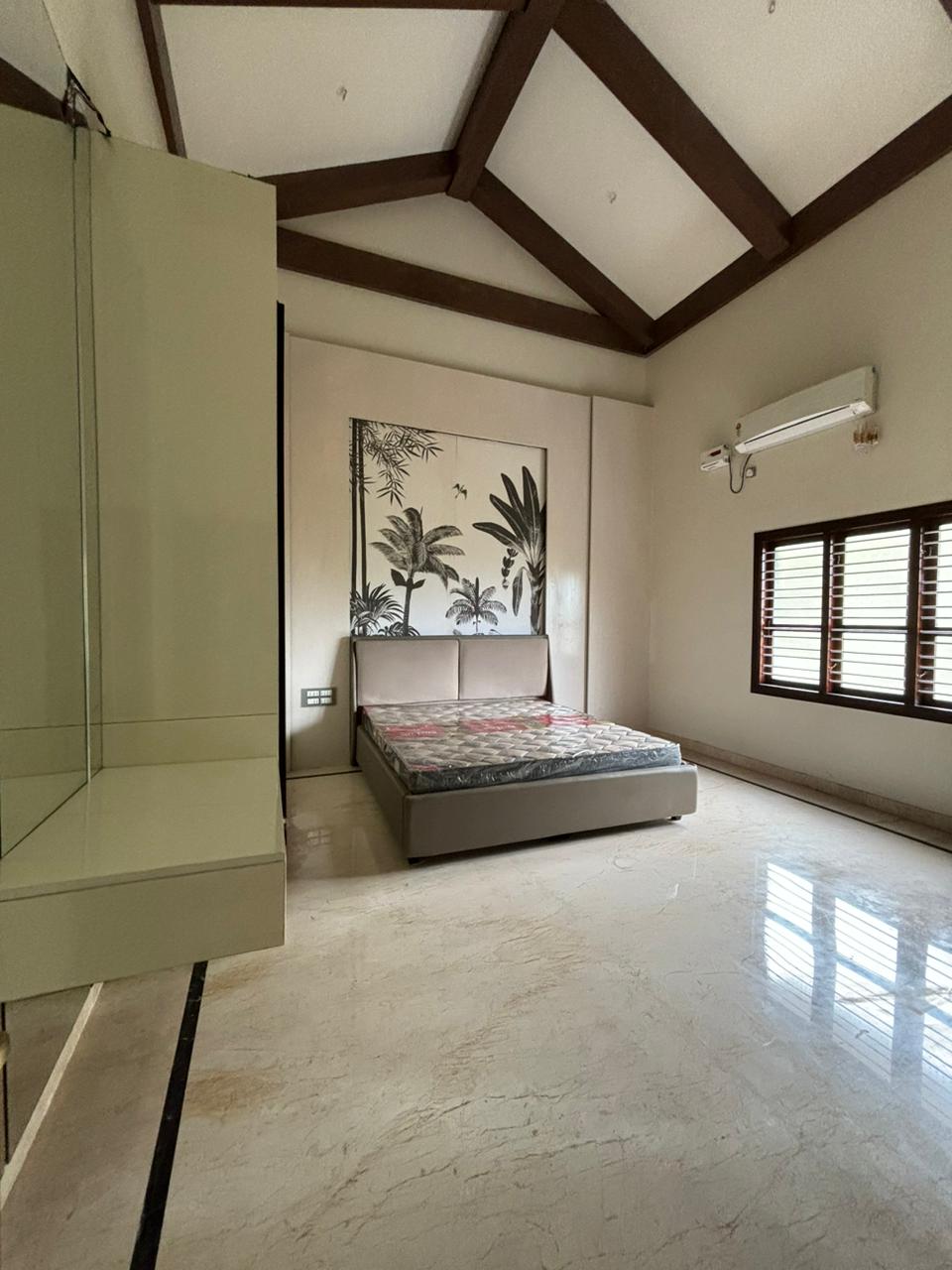 Tranquil Bedroom with Vaulted Ceiling in Bengaluru | Material Depot