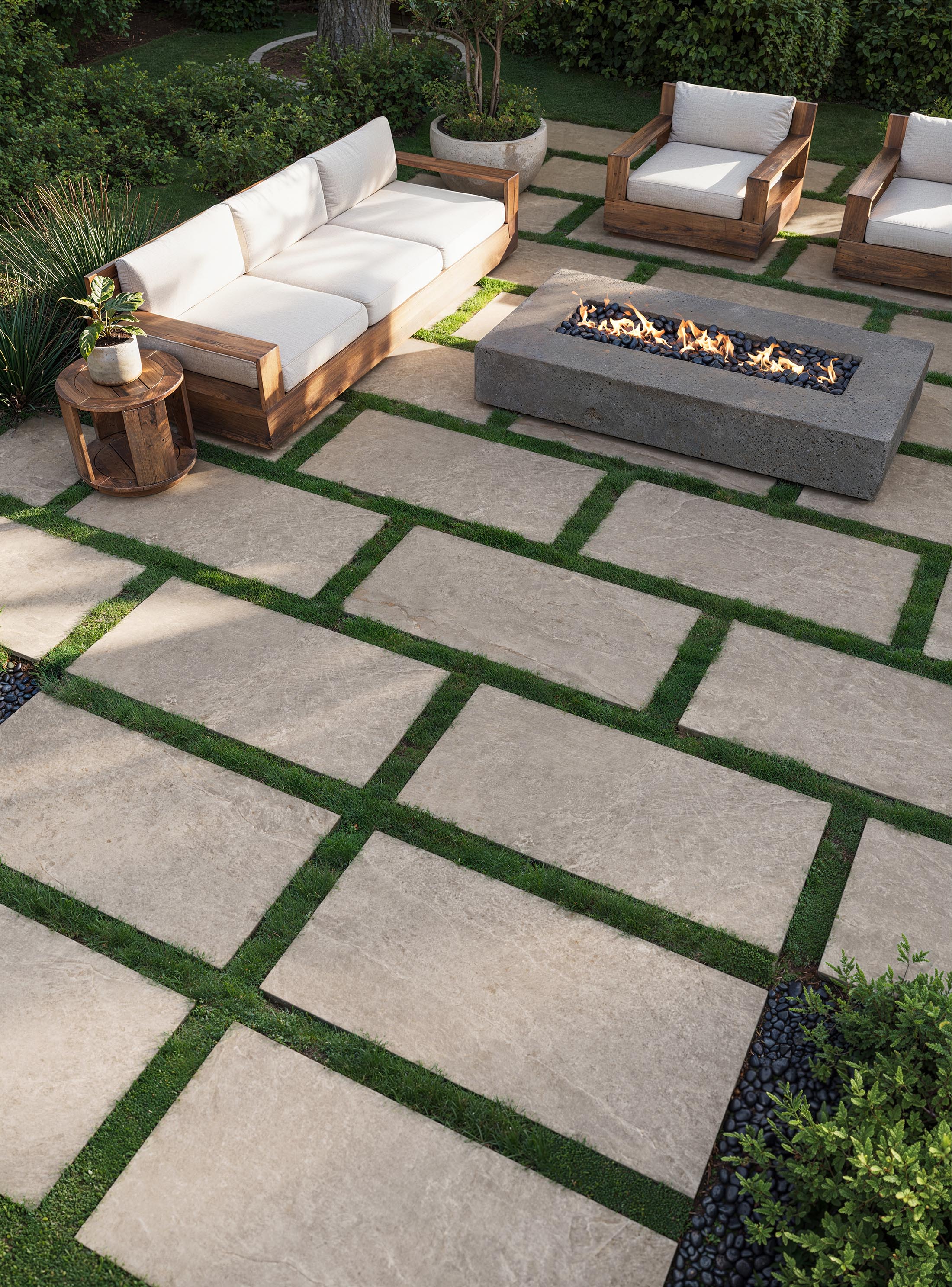 Tranquil Outdoor Patio with Beige Porcelain Tile Flooring, Fire Pit, and Lush Greenery | Material Depot