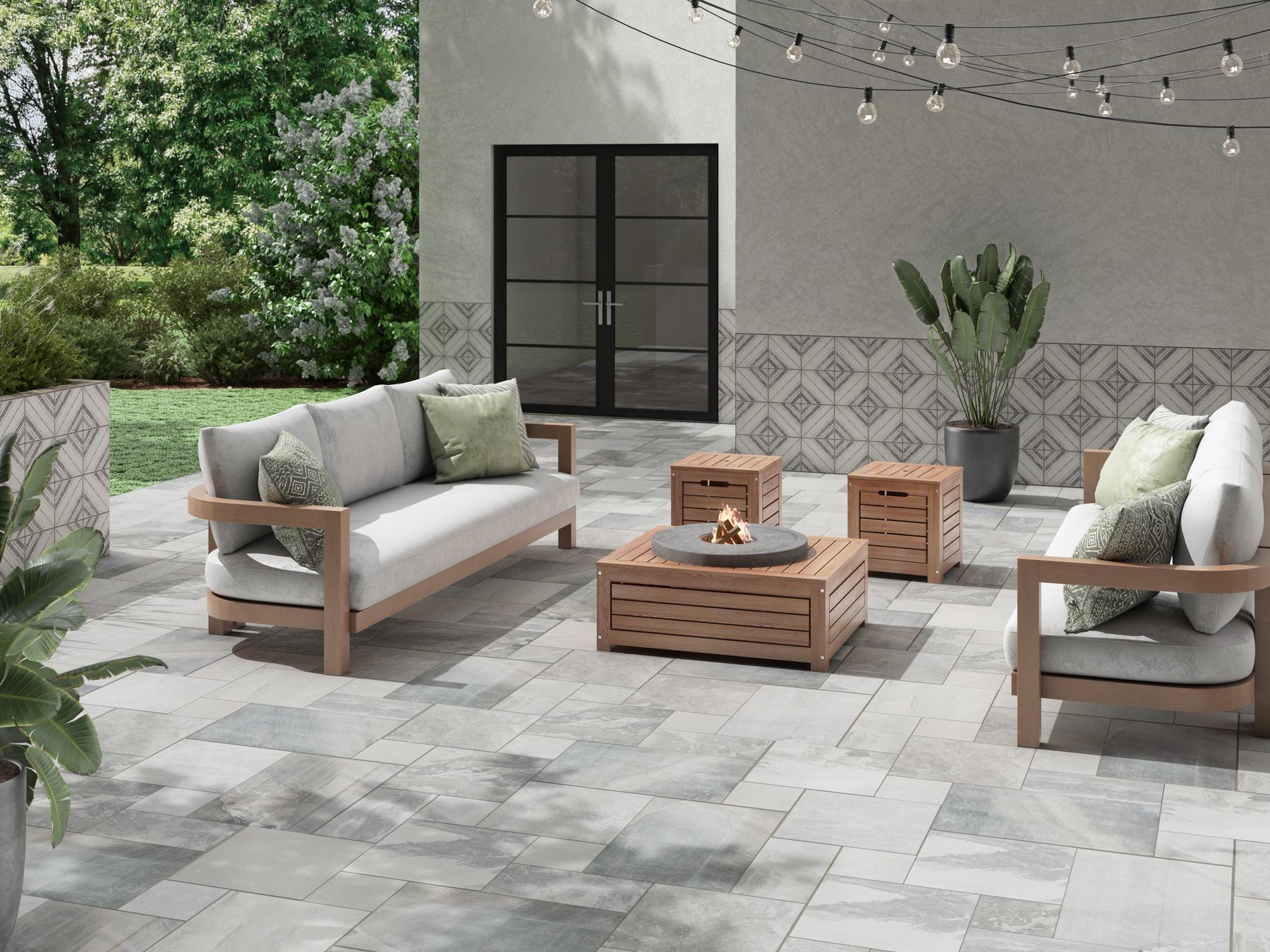 Outdoor area with grey marble floor and patterned wall tiles